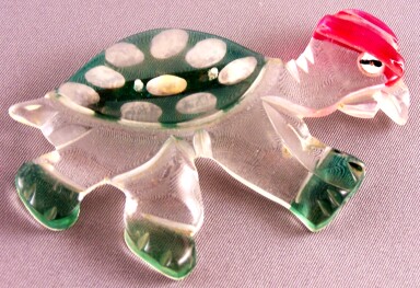 BP7 tinted lucite turtle pin